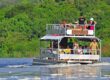 Boat cruise on the bottom side of murchison falls on Lake Albert.