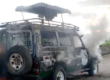 Tourism vehicle set on fire after rebels killing tourists.